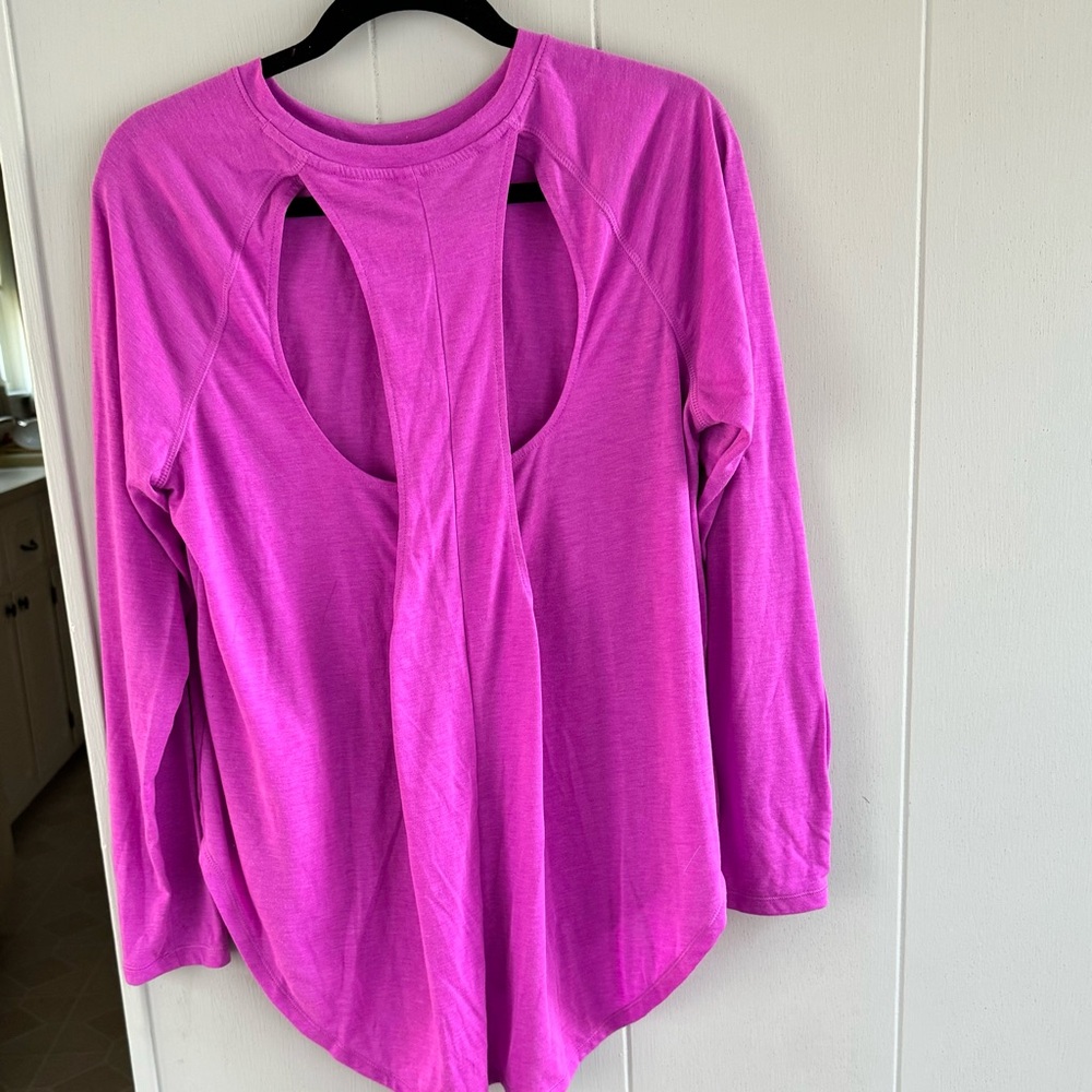 Under Armour long sleeved open back shirt. XL
